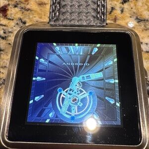 Smartwatch with Black Strap and white stitching